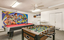 Game-room with pool table and foosball table