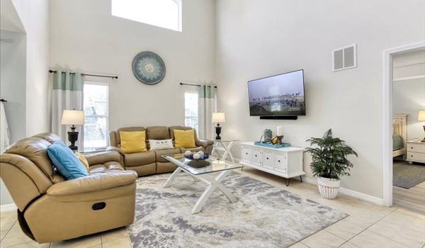 Spacious family room with comfortable leather furniture
