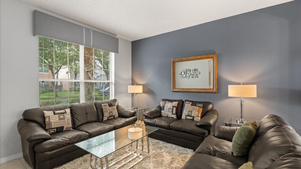 This spacious living room offers comfortable furniture