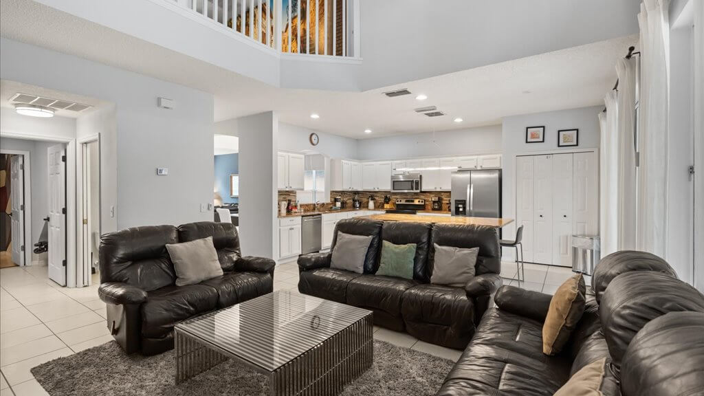 Family room offers comfortable leather seating