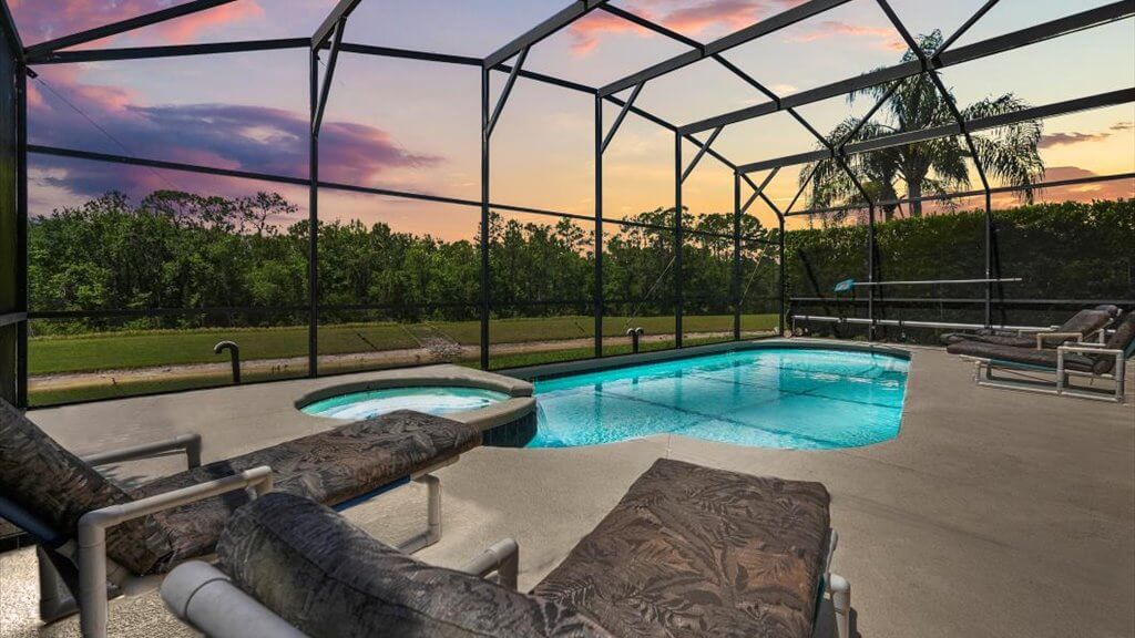 Private pool, spa and lanai, an evening view