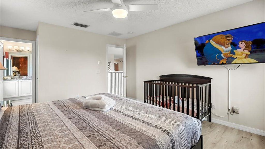 Master bedroom #2: With a 50" ROKU-SMART TV, and a crib