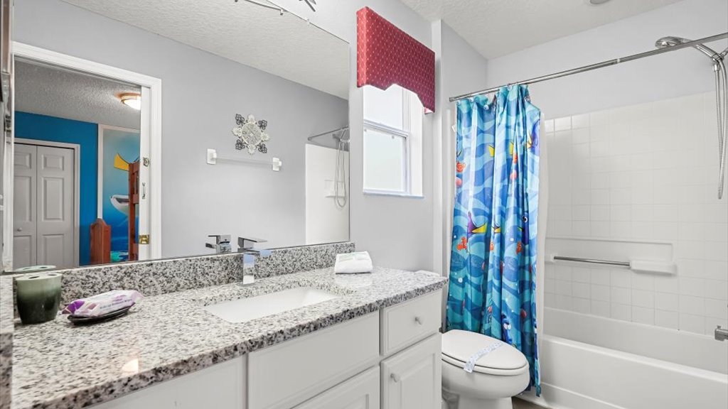 Emerald Island Rental: Jack and Jill bathroom to bedroom #3 and #4