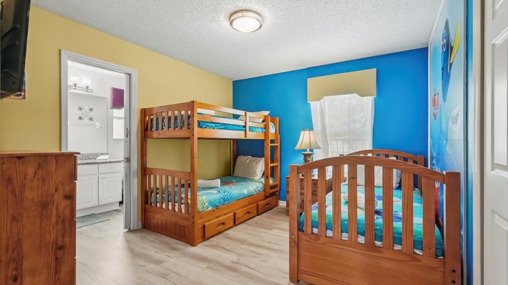 Bedroom #4: Dory themed bedroom with twin-twin bunk bed and a twin bed