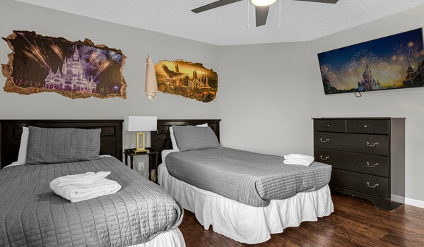 This bedroom #4  has two twin beds, and a 50"  ROKU SMART TV