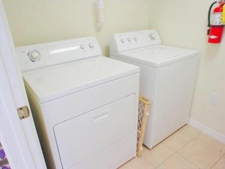 Laundry room with full-size washer and dryer
