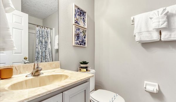 Private bathroom located on first floor with easy access to Bedroom #2