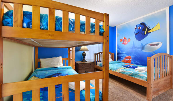Bedroom #4: Dory themed bedroom with twin-twin bunk bed and a twin bed